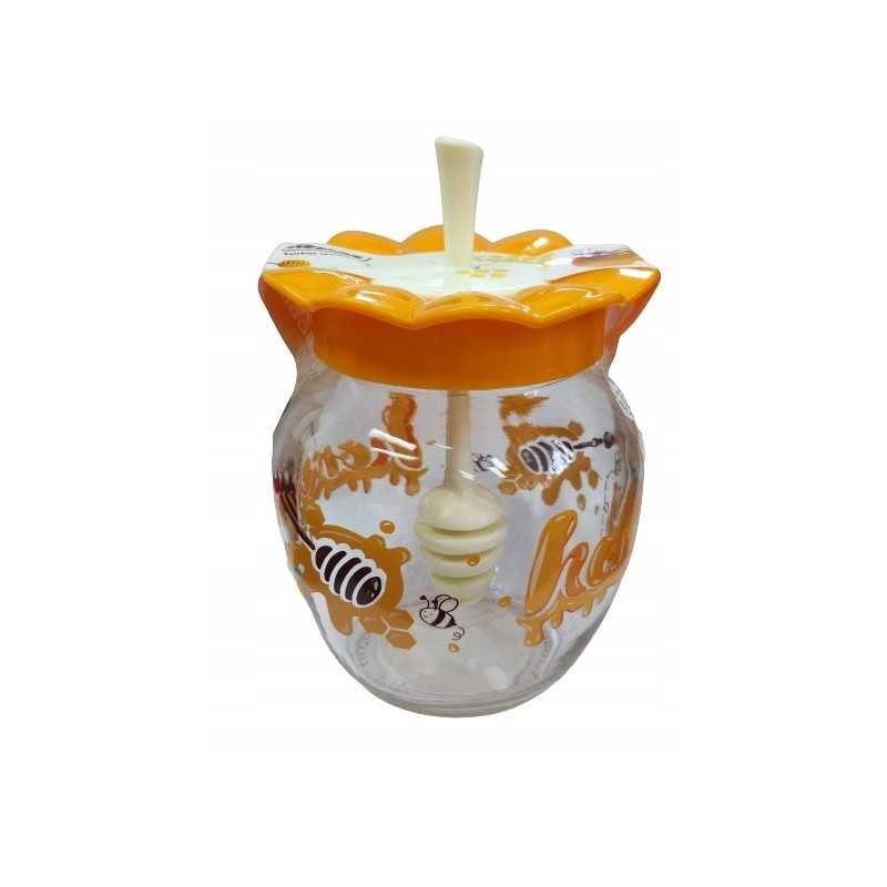 Stiklainis su kaušeliu