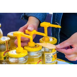 Plastikinis medaus dozatorius su dangteliais - doz1