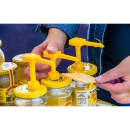 medaus pompa su užsukamu dangteliu ant stiklainio