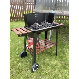 Garden charcoal grill with adjustable grate