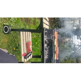 Garden charcoal grill with adjustable grate
