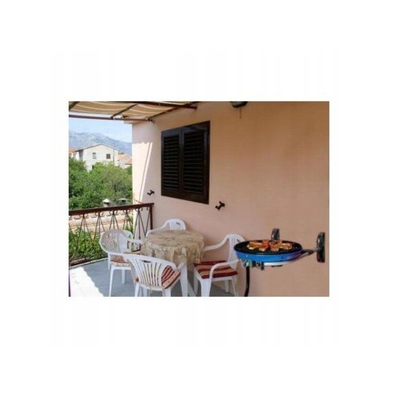 Cadac wall mount for hanging a carri chef gas grill