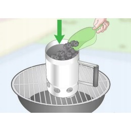 Kaminas apšviečia grilį su briketais