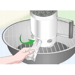 Kaminas apšviečia grilį su briketais