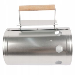 Kaminas anglies briketų kepsninei apšviesti