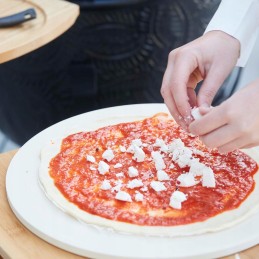 Apvalus kepsninės picos akmuo