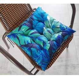 Dygsniuota kėdės pagalvėlė be kaklaraiščių, 35x35, turkio spalvos lapai, tamsiai mėlynas fonas