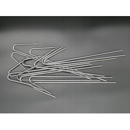 Inkariniai kaiščiai neaustiniam geotinkleliui